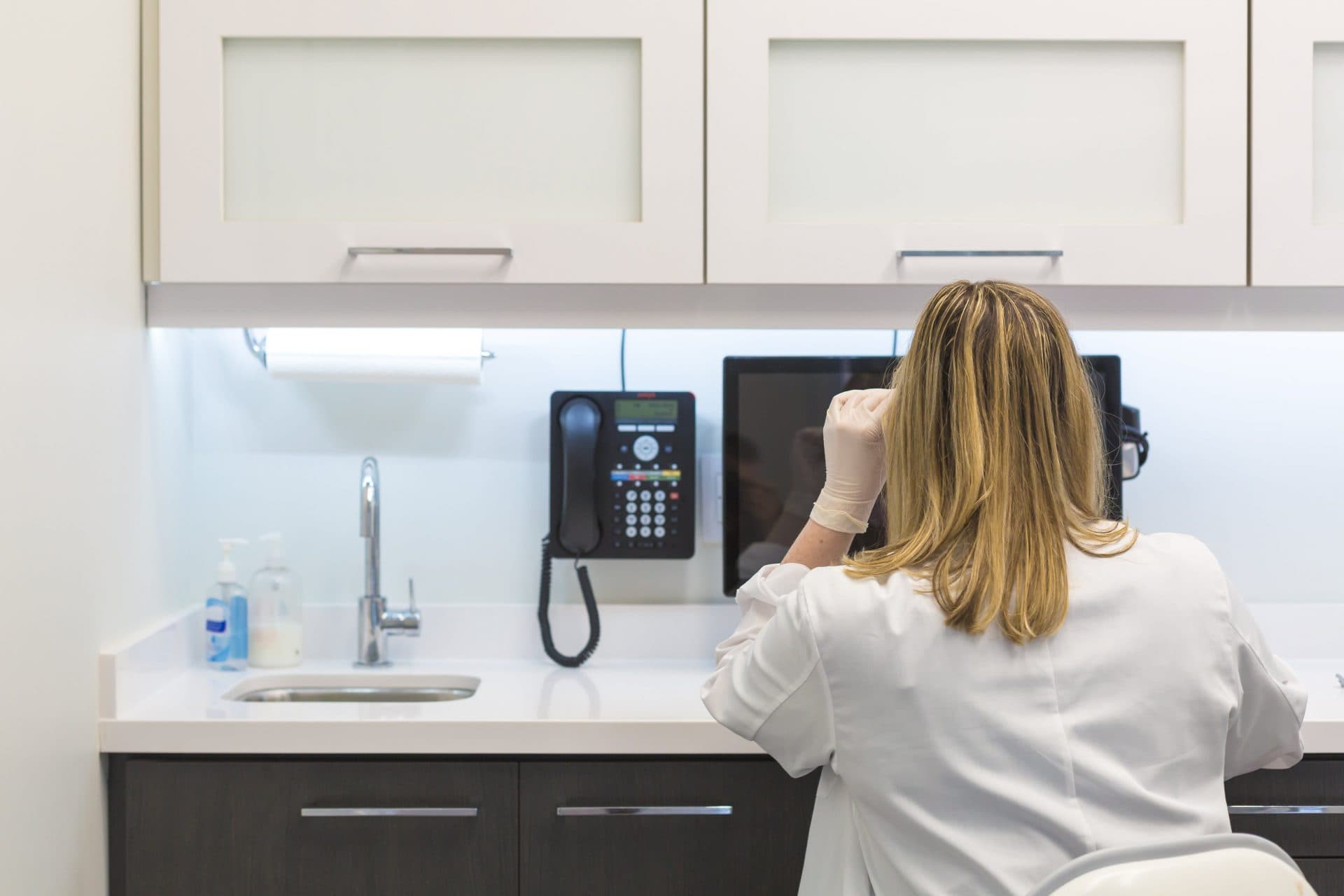 Medical staff working at computer